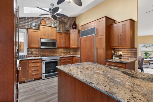 1486 Sunwood Road Se, Calgary, AB - Indoor Photo Showing Kitchen With Upgraded Kitchen