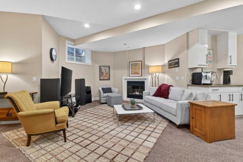 4619 84 Street Nw, Calgary, AB - Indoor Photo Showing Living Room With Fireplace