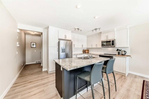 154 Sage Hill Grove Nw, Calgary, AB - Indoor Photo Showing Kitchen With Double Sink With Upgraded Kitchen