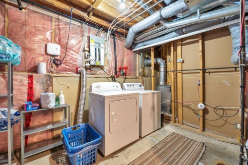 32 Somercrest Manor Sw, Calgary, AB - Indoor Photo Showing Laundry Room
