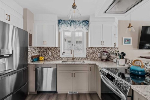 60 Hunterhorn Crescent Ne, Calgary, AB - Indoor Photo Showing Kitchen With Stainless Steel Kitchen With Double Sink With Upgraded Kitchen