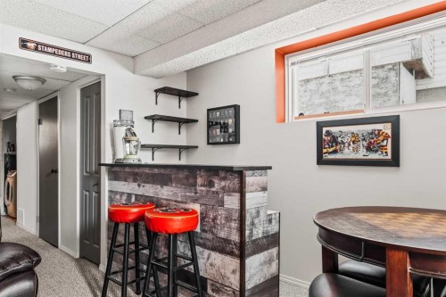 60 Hunterhorn Crescent Ne, Calgary, AB - Indoor With Fireplace