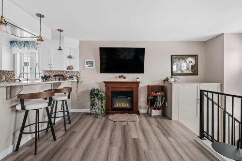 60 Hunterhorn Crescent Ne, Calgary, AB - Indoor With Fireplace