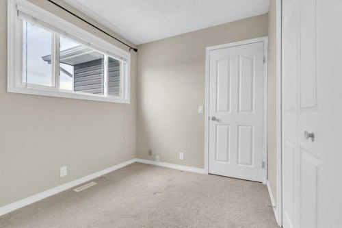 87 Castleglen Road Ne, Calgary, AB - Indoor Photo Showing Other Room