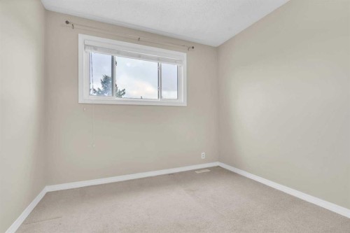 87 Castleglen Road Ne, Calgary, AB - Indoor Photo Showing Other Room