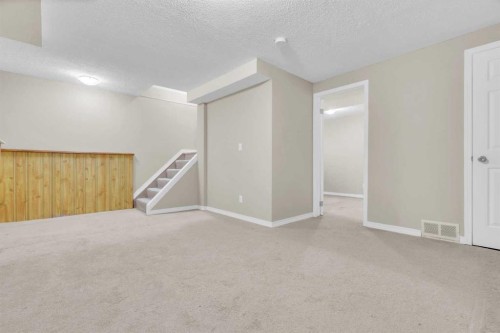 87 Castleglen Road Ne, Calgary, AB - Indoor Photo Showing Other Room