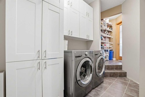 202 New Brighton Manor Se, Calgary, AB - Indoor Photo Showing Laundry Room