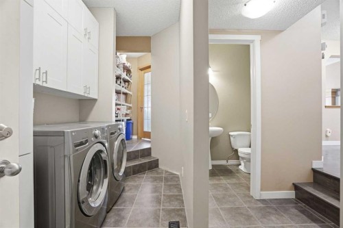 202 New Brighton Manor Se, Calgary, AB - Indoor Photo Showing Laundry Room