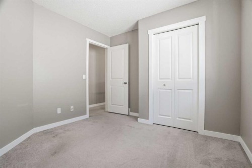 202 New Brighton Manor Se, Calgary, AB - Indoor Photo Showing Other Room