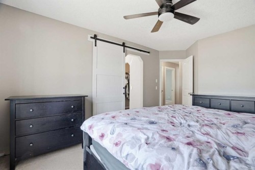 202 New Brighton Manor Se, Calgary, AB - Indoor Photo Showing Bedroom