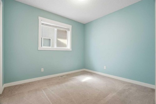 202 New Brighton Manor Se, Calgary, AB - Indoor Photo Showing Other Room
