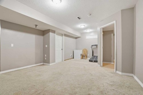 202 New Brighton Manor Se, Calgary, AB - Indoor Photo Showing Other Room
