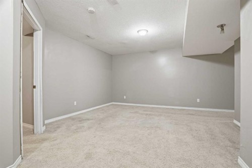 202 New Brighton Manor Se, Calgary, AB - Indoor Photo Showing Other Room