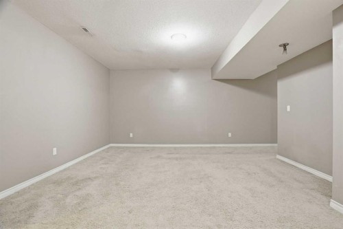 202 New Brighton Manor Se, Calgary, AB - Indoor Photo Showing Other Room