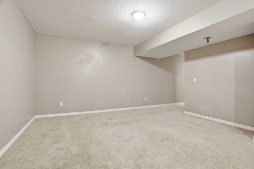 202 New Brighton Manor Se, Calgary, AB - Indoor Photo Showing Other Room