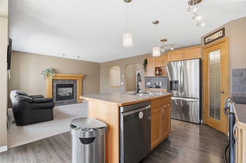 202 New Brighton Manor Se, Calgary, AB - Indoor Photo Showing Kitchen With Double Sink