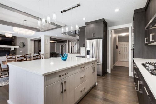 109 Kinniburgh Bay, Chestermere, AB - Indoor Photo Showing Kitchen With Upgraded Kitchen