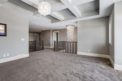 109 Kinniburgh Bay, Chestermere, AB - Indoor Photo Showing Other Room