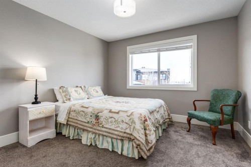 109 Kinniburgh Bay, Chestermere, AB - Indoor Photo Showing Bedroom