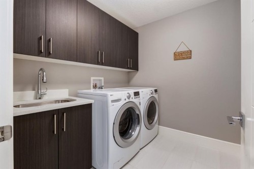109 Kinniburgh Bay, Chestermere, AB - Indoor Photo Showing Laundry Room