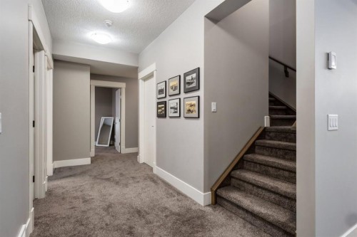 109 Kinniburgh Bay, Chestermere, AB - Indoor Photo Showing Other Room