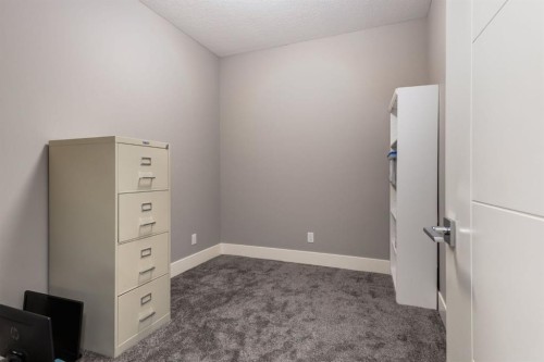 109 Kinniburgh Bay, Chestermere, AB - Indoor Photo Showing Other Room