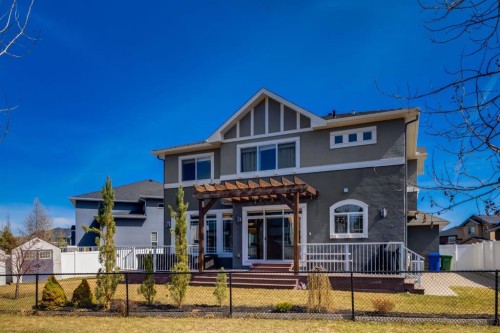 109 Kinniburgh Bay, Chestermere, AB - Outdoor With Deck Patio Veranda With Facade
