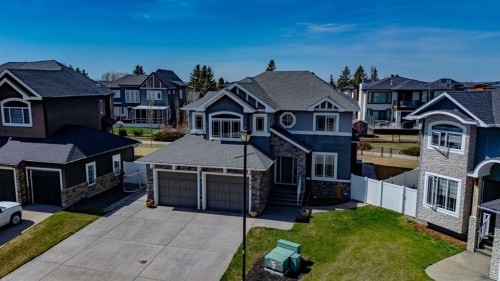 109 Kinniburgh Bay, Chestermere, AB - Outdoor With Facade