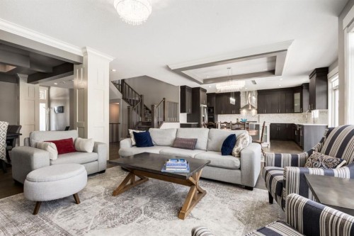 109 Kinniburgh Bay, Chestermere, AB - Indoor Photo Showing Living Room