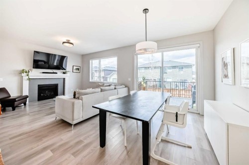 81 Willow Court, Cochrane, AB - Indoor With Fireplace