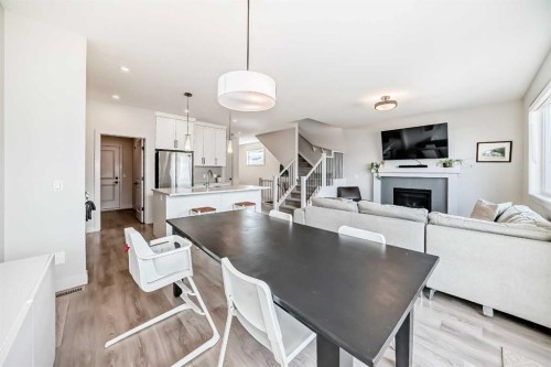 81 Willow Court, Cochrane, AB - Indoor With Fireplace