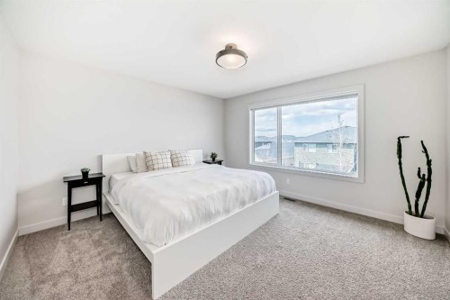 81 Willow Court, Cochrane, AB - Indoor Photo Showing Bedroom