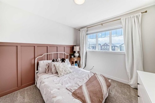 81 Willow Court, Cochrane, AB - Indoor Photo Showing Bedroom