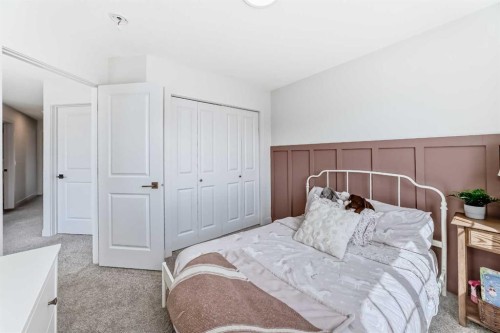 81 Willow Court, Cochrane, AB - Indoor Photo Showing Bedroom