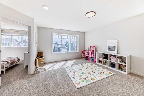 81 Willow Court, Cochrane, AB - Indoor Photo Showing Bedroom