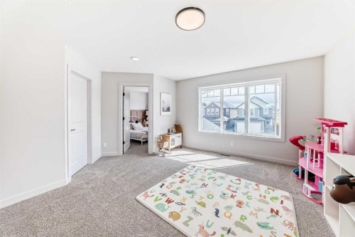 81 Willow Court, Cochrane, AB - Indoor Photo Showing Bedroom