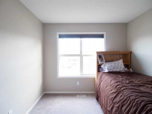 304 Chaparral Valley Square Se, Calgary, AB - Indoor Photo Showing Bedroom
