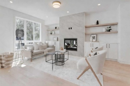 520 22 Avenue Nw, Calgary, AB - Indoor Photo Showing Living Room With Fireplace