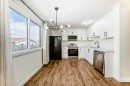 25 Erin Ridge Road Se, Calgary, AB  - Indoor Photo Showing Kitchen With Upgraded Kitchen 
