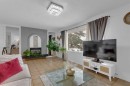 60 Dalhurst Way Nw, Calgary, AB  - Indoor Photo Showing Living Room 