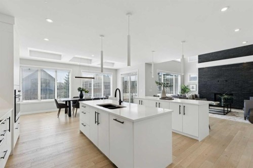 7865 8A Avenue Sw, Calgary, AB - Indoor Photo Showing Kitchen With Double Sink With Upgraded Kitchen