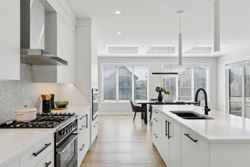 7865 8A Avenue Sw, Calgary, AB - Indoor Photo Showing Kitchen With Double Sink With Upgraded Kitchen