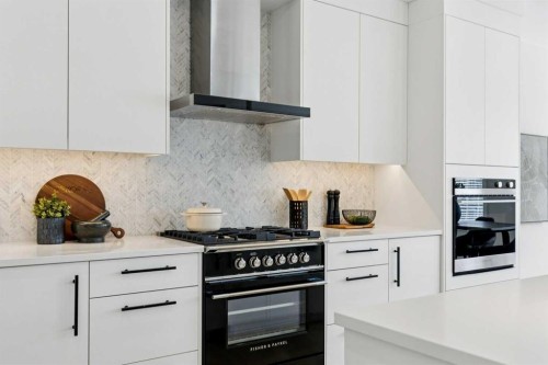 7865 8A Avenue Sw, Calgary, AB - Indoor Photo Showing Kitchen With Upgraded Kitchen