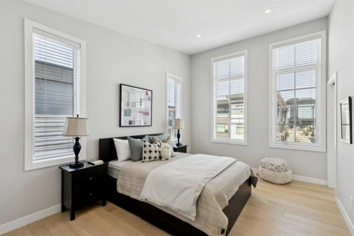 7865 8A Avenue Sw, Calgary, AB - Indoor Photo Showing Bedroom