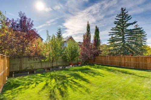 7865 8A Avenue Sw, Calgary, AB - Outdoor With Backyard