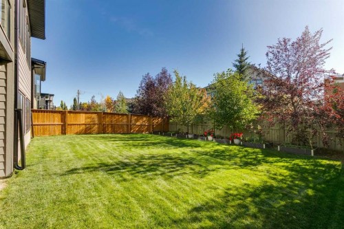 7865 8A Avenue Sw, Calgary, AB - Outdoor With Backyard