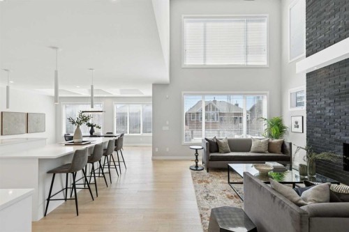 7865 8A Avenue Sw, Calgary, AB - Indoor Photo Showing Living Room With Fireplace