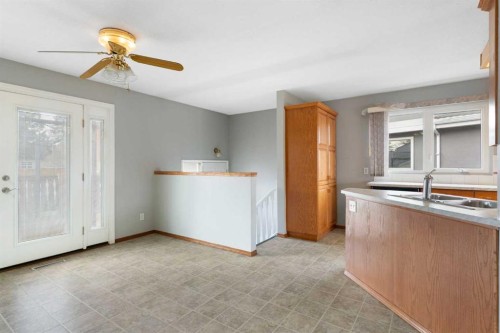 3228 Breen Crescent Nw, Calgary, AB - Indoor Photo Showing Kitchen With Double Sink