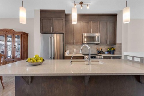 70 Sage Bluff Gate Nw, Calgary, AB - Indoor Photo Showing Kitchen With Stainless Steel Kitchen With Double Sink With Upgraded Kitchen