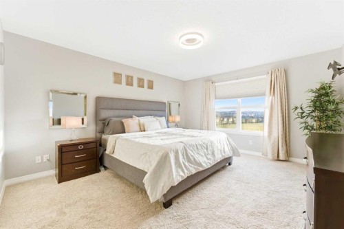 71 Evansfield Rise Nw, Calgary, AB - Indoor Photo Showing Bedroom